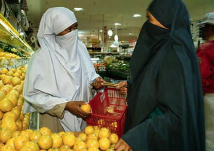women shopping at supermarket