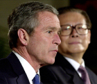 Presidents Bush and Jiang.  Click for press conference transcript.