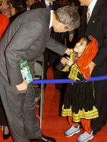 President Bush with Afghan-American schoolgirl.